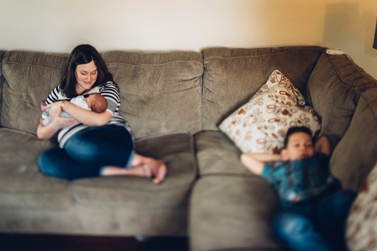 lounging on the couch with a newborn